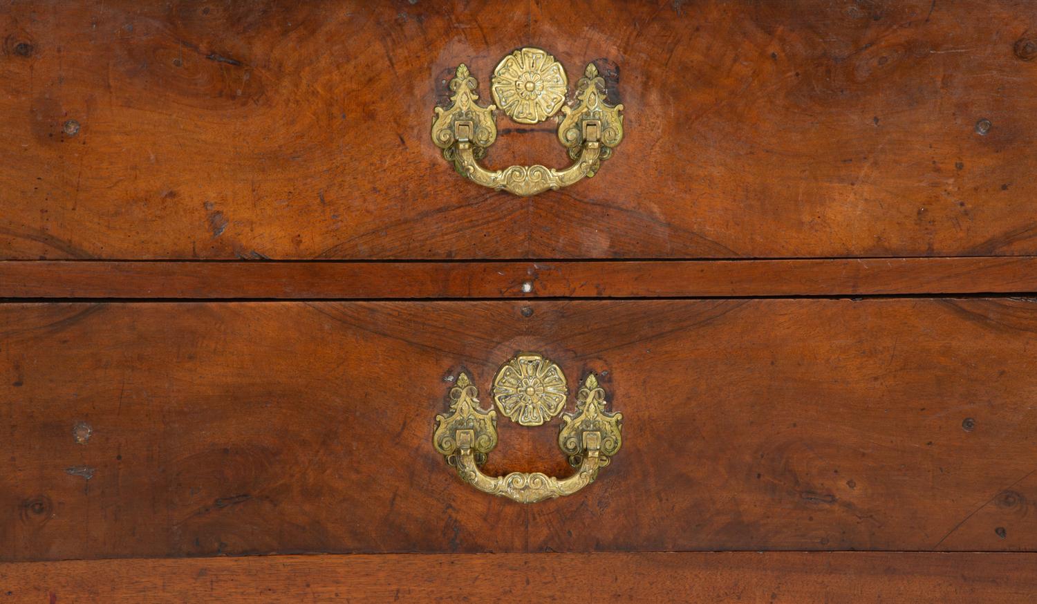 A Continental Walnut Two-Drawer Commode