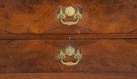 A Continental Walnut Two-Drawer Commode