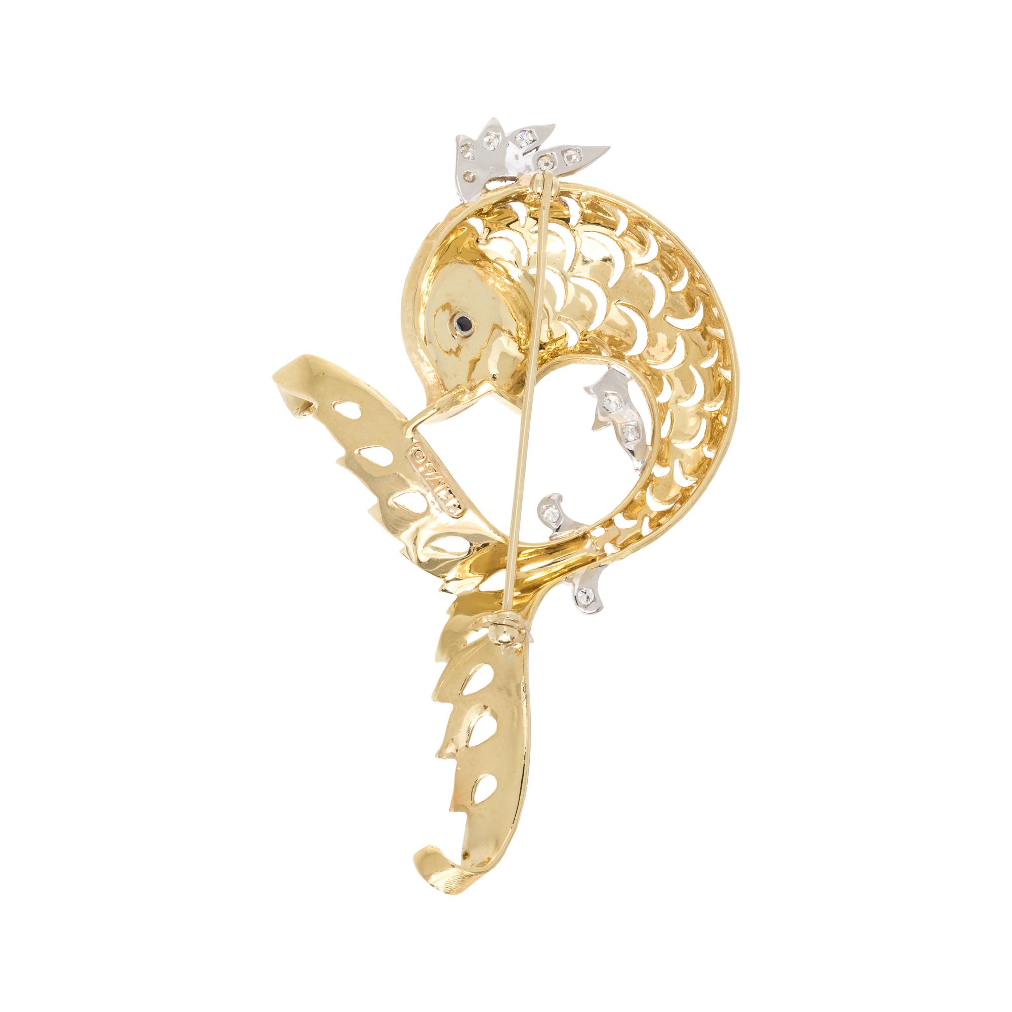 HAMMERMAN BROTHERS, BICOLOR GOLD, DIAMOND AND SAPPHIRE FISH BROOCH
