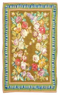 A Needlepoint Rug Length 8 feet 1 inch x width 5 feet 10 inches.