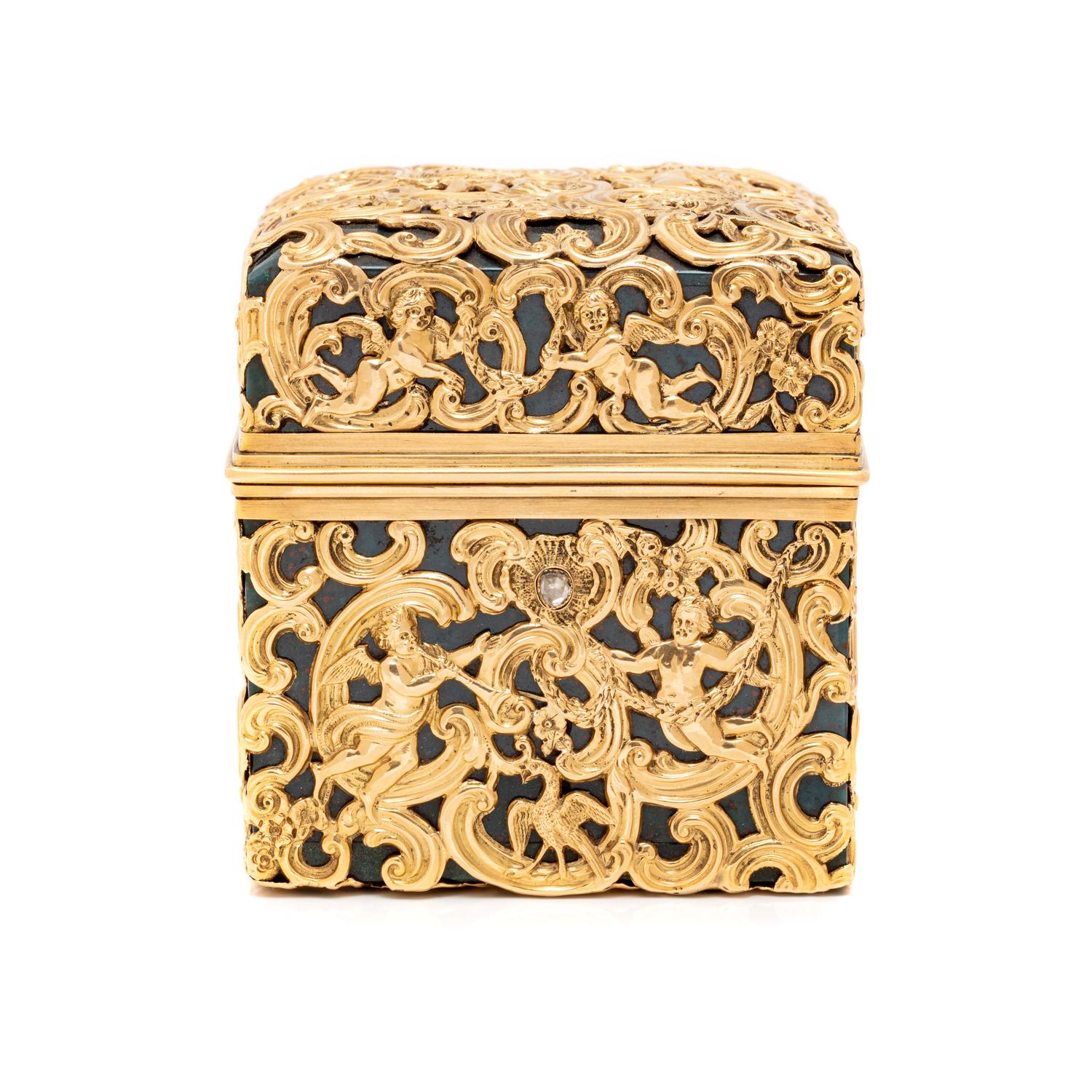 An English Gold and Diamond Mounted Carved Bloodstone Cased Scent Flask Set