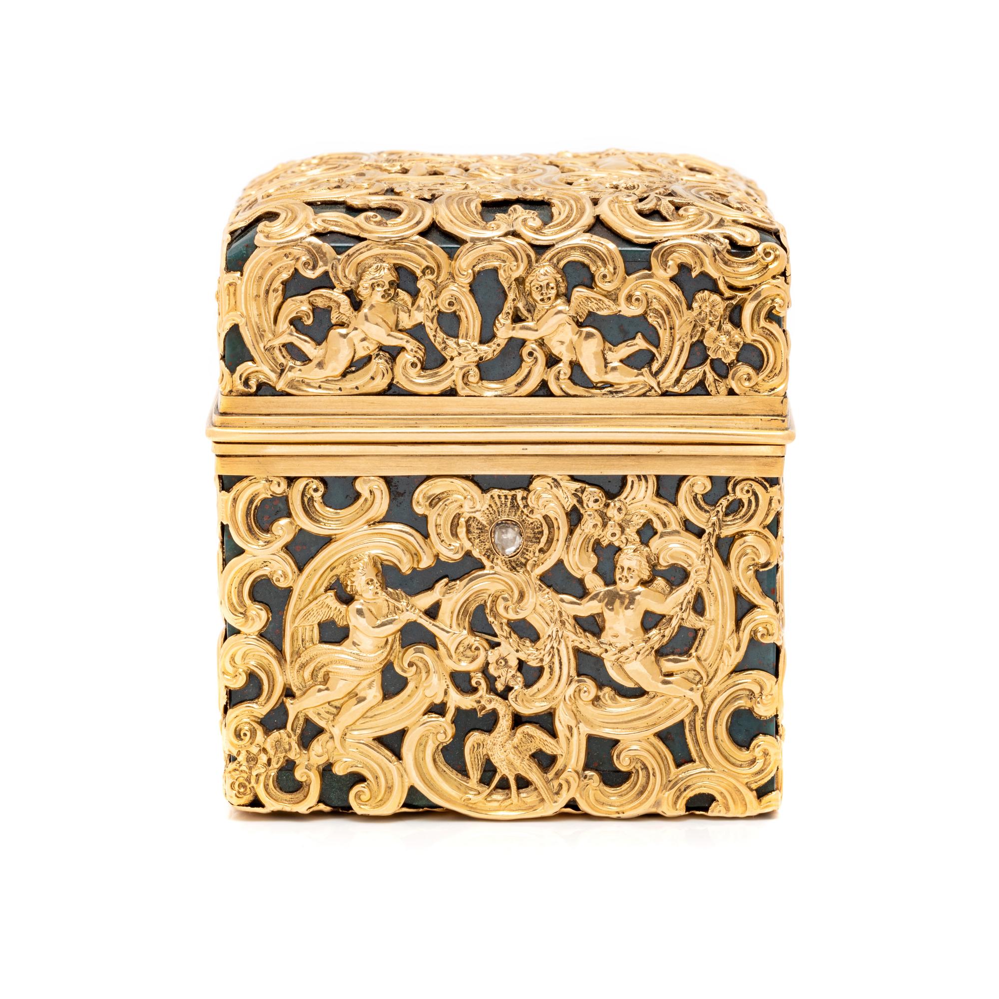 An English Gold and Diamond Mounted Carved Bloodstone Cased Scent Flask Set