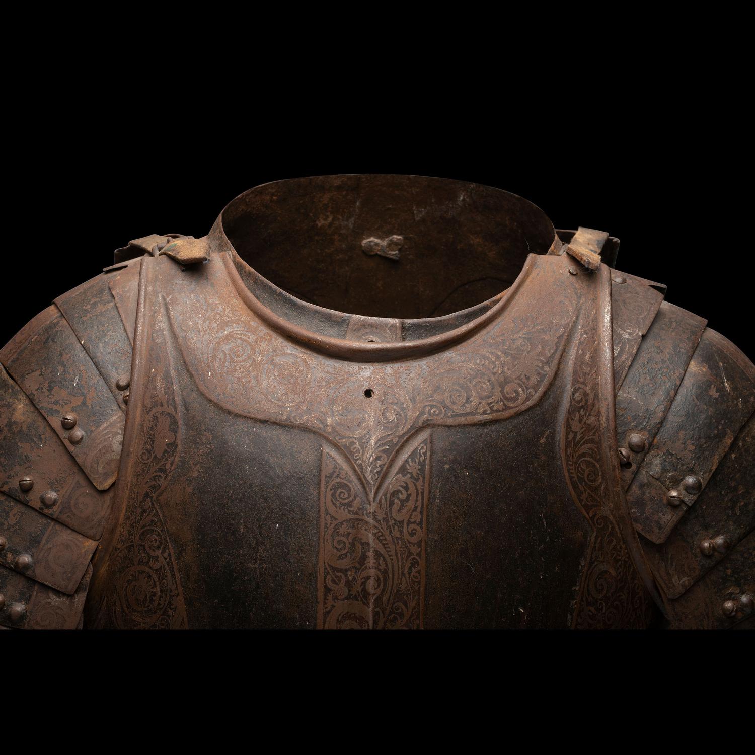A 17th Century German Etched and Painted Half Suit of Armor