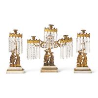 A "Leatherstocking Tales" Three-Piece Cast Brass, Marble, and Brass Girandole Garniture