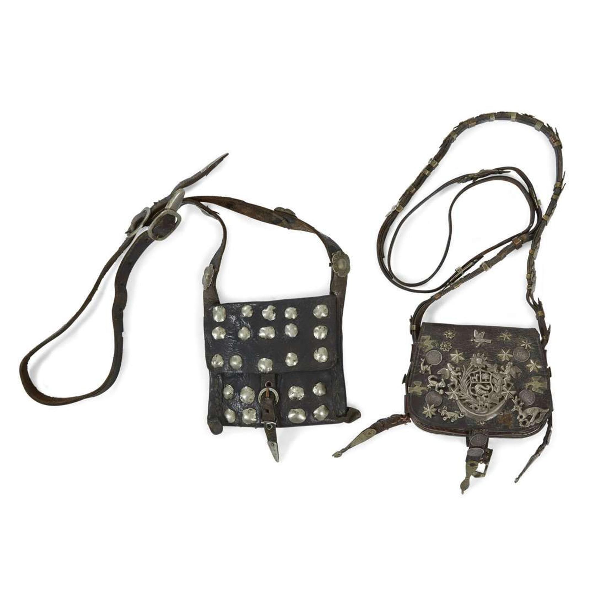 Two leather bags with silver studs and milagros South American, probably Peru, late 19th/early 20th century