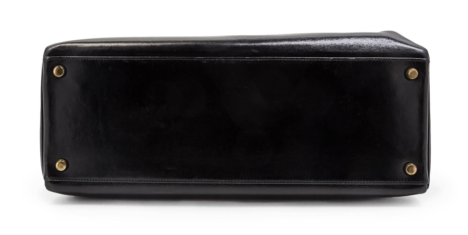 An Hermes 35cm Black Leather Kelly Bag, 14 x 8 x 7 inches.
