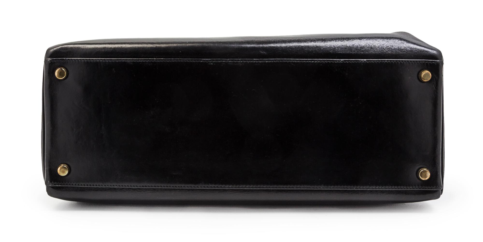 An Hermes 35cm Black Leather Kelly Bag, 14 x 8 x 7 inches.
