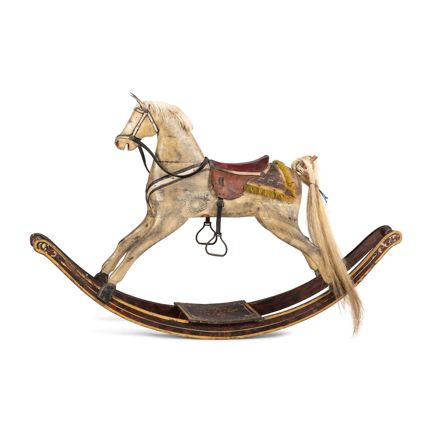 A Carved and Painted Wood Rocking Horse