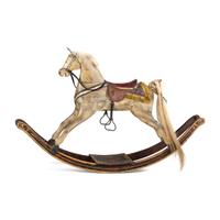 A Carved and Painted Wood Rocking Horse