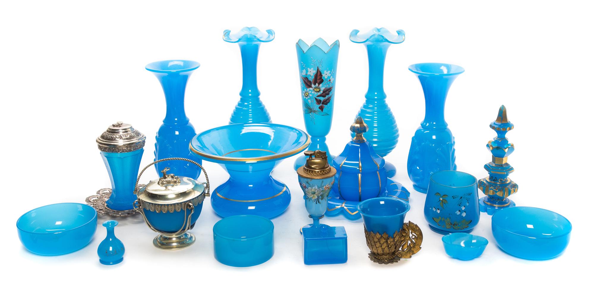 A Collection of Blue Opaline Glass Articles Height of tallest 12 inches.