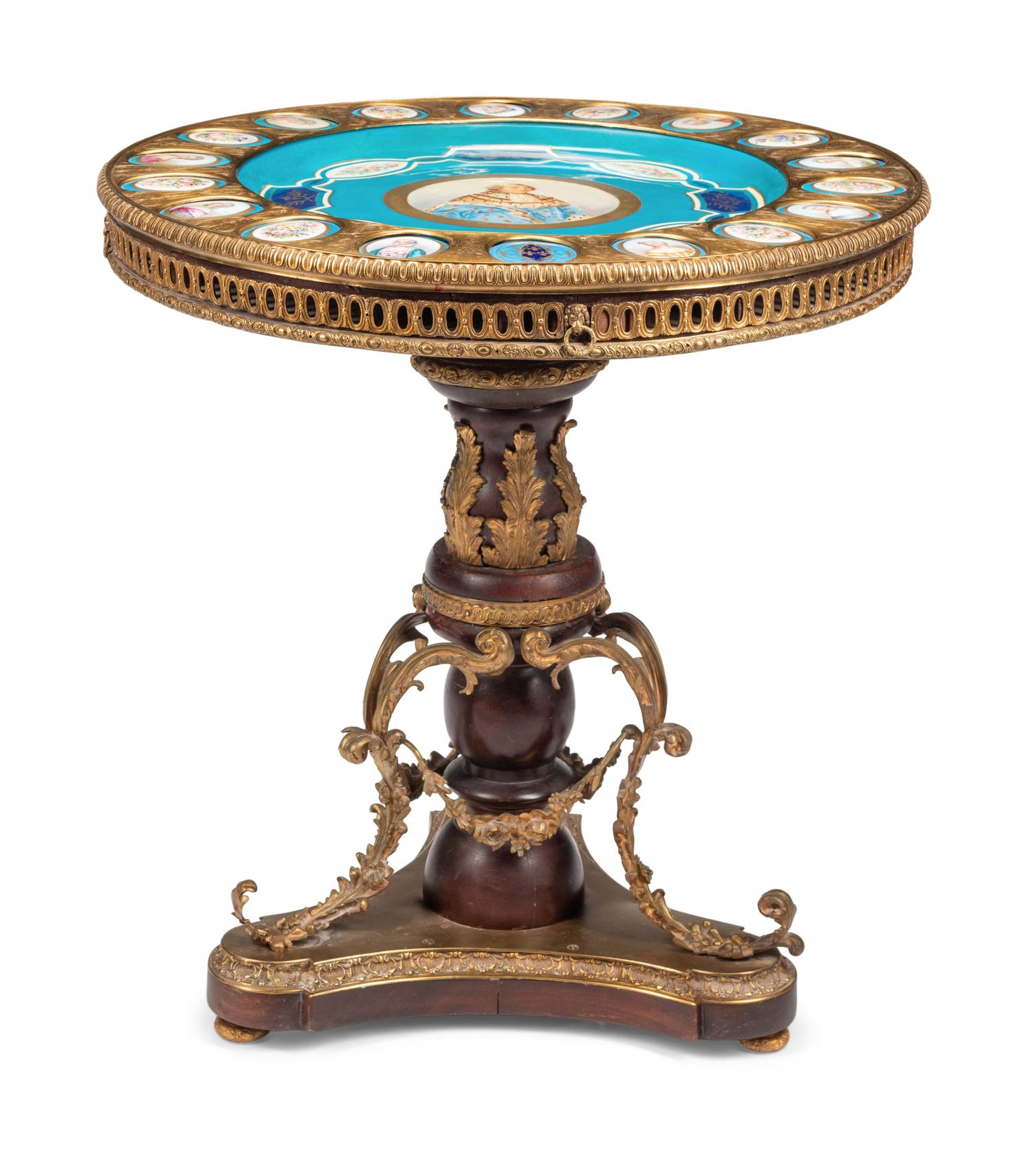 A Louis XVI Style Gilt Bronze and Porcelain Mounted Guéridon