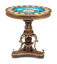 A Louis XVI Style Gilt Bronze and Porcelain Mounted Guéridon