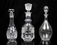 Five Molded or Cut Glass Decanters Height of tallest 13 inches.