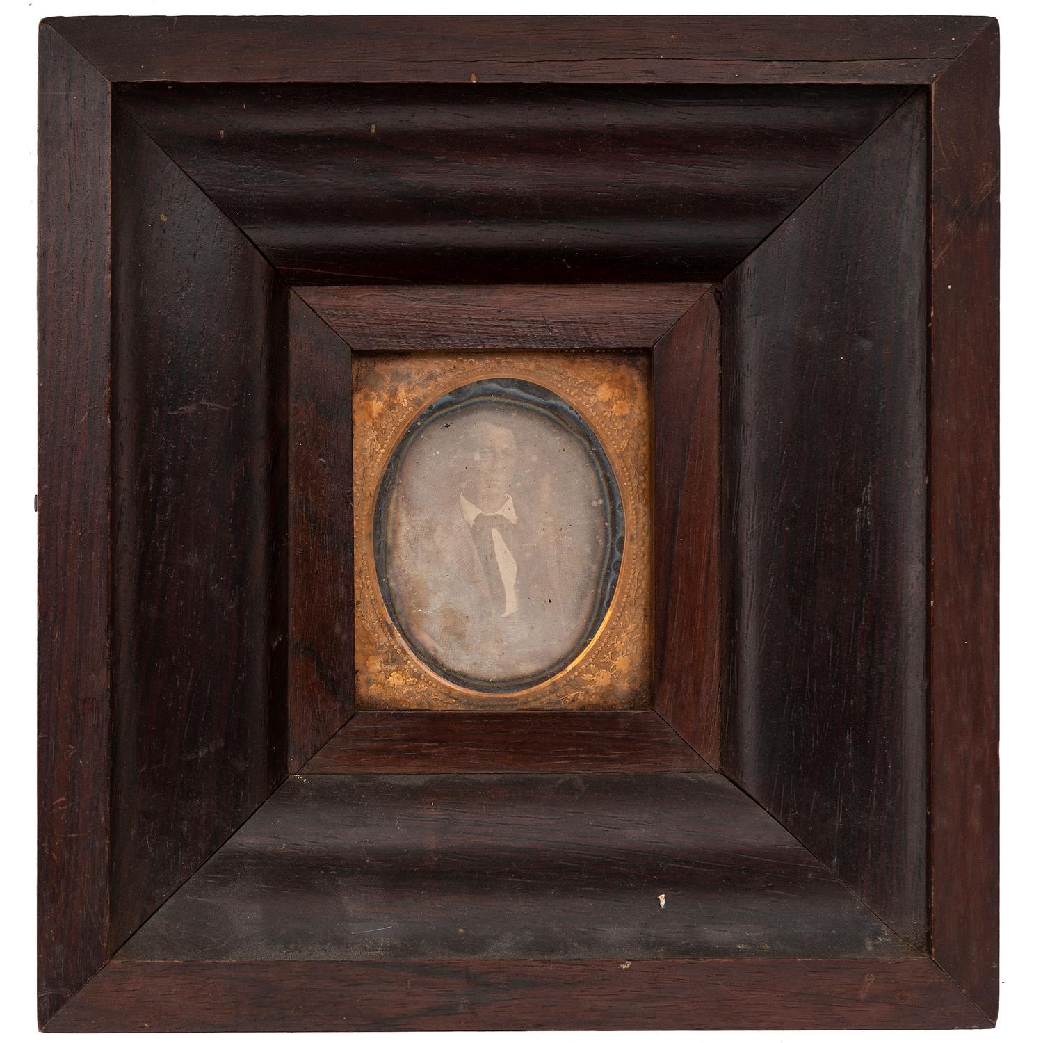 [EARLY PHOTOGRAPHY - PORTRAITURE]. A group of 4 framed daguerreotypes of male and female subjects, including: