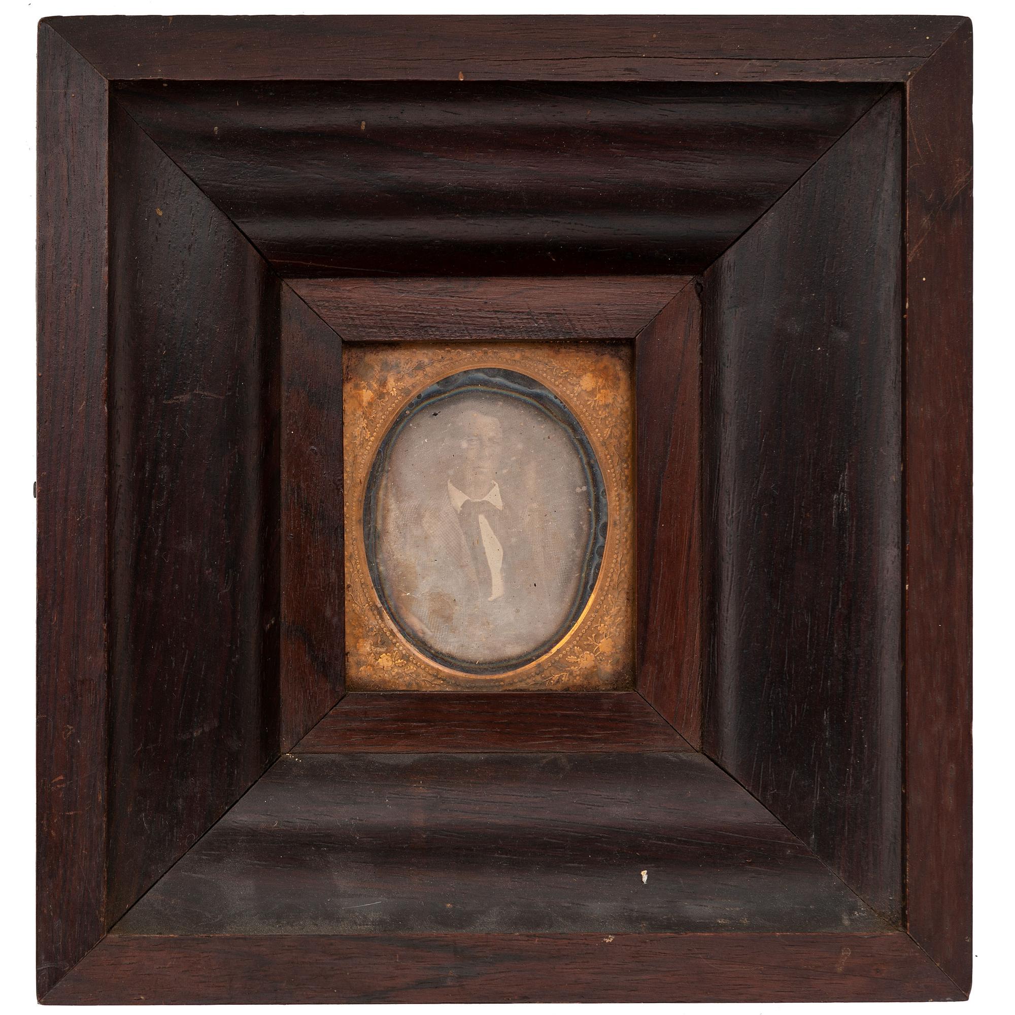 [EARLY PHOTOGRAPHY - PORTRAITURE]. A group of 4 framed daguerreotypes of male and female subjects, including: