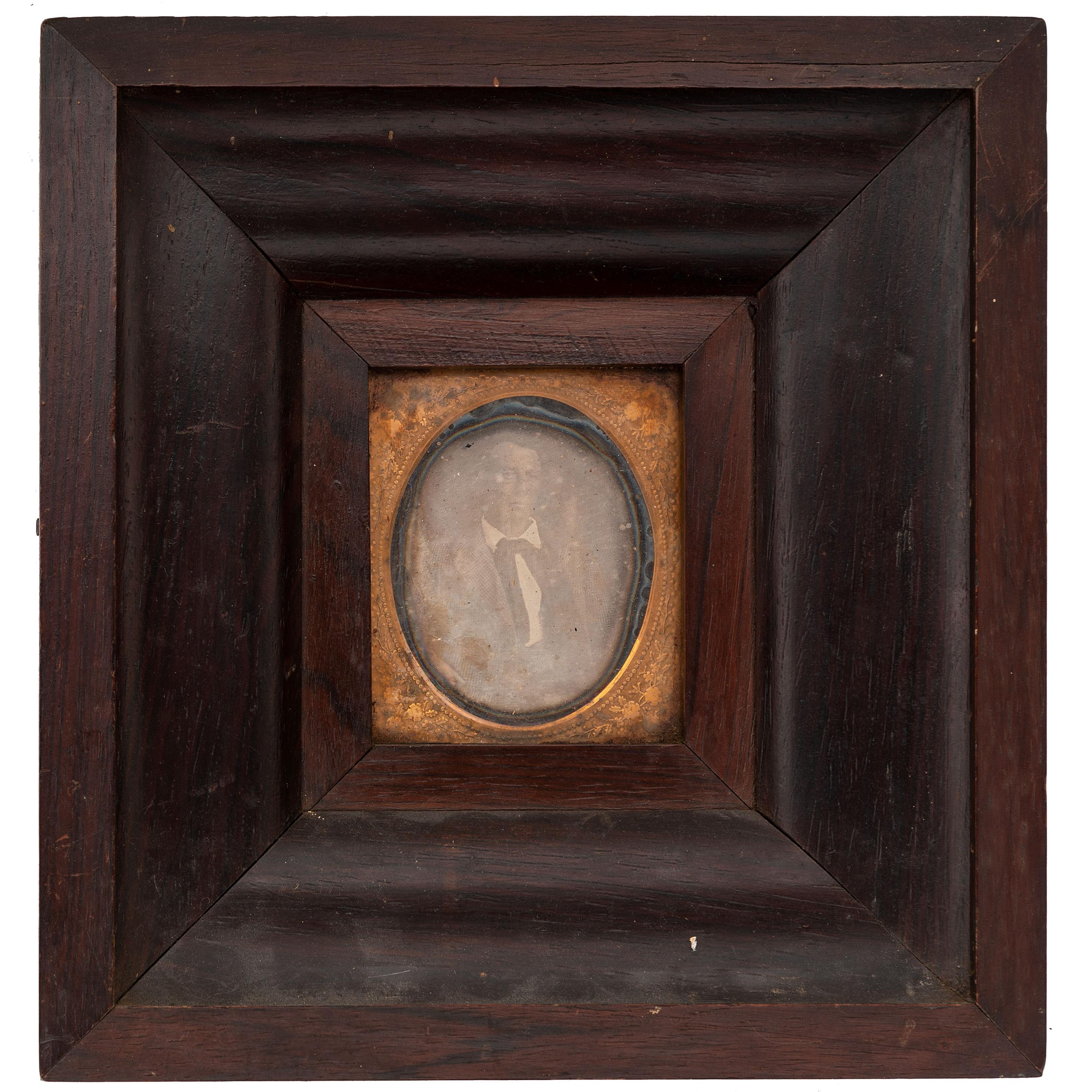 [EARLY PHOTOGRAPHY - PORTRAITURE]. A group of 4 framed daguerreotypes of male and female subjects, including: