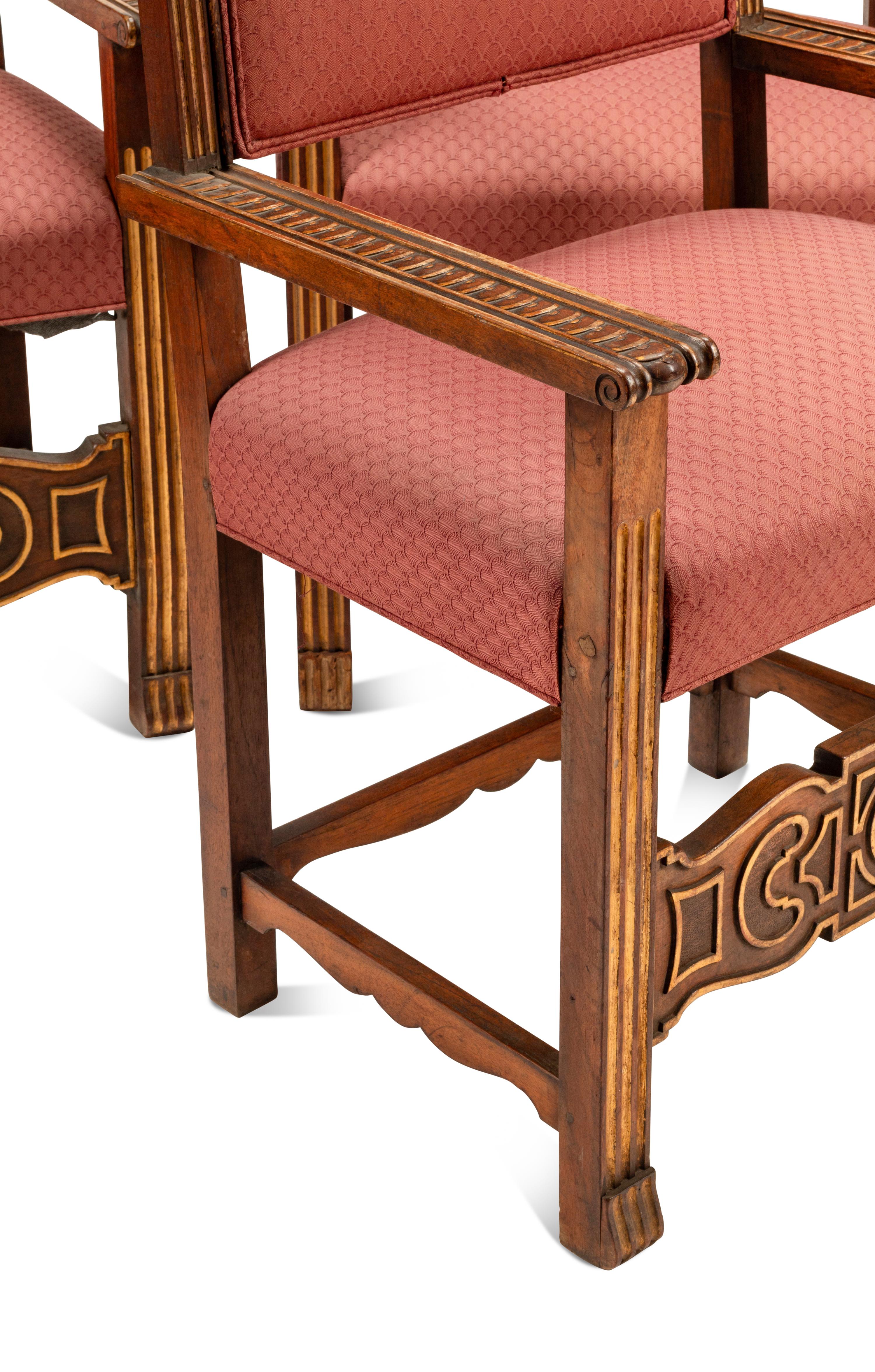 A Set of Four Flemish Baroque Revival Parcel Gilt Walnut Armchairs