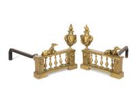 A Pair of French Brass Chenets with Recumbent Dogs