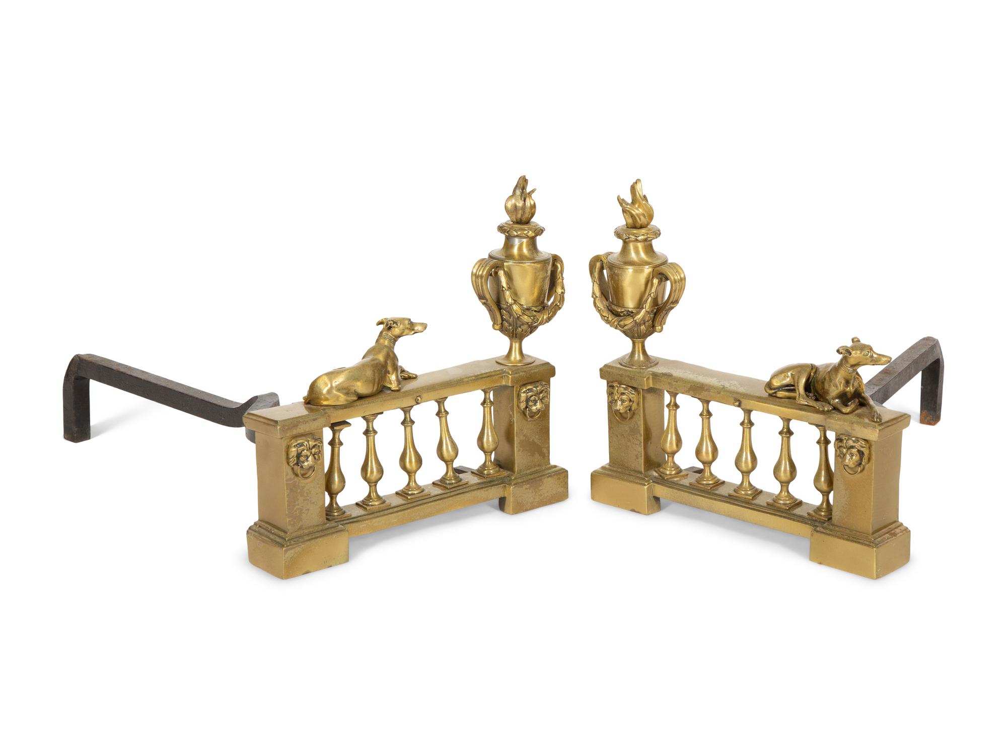 A Pair of French Brass Chenets with Recumbent Dogs