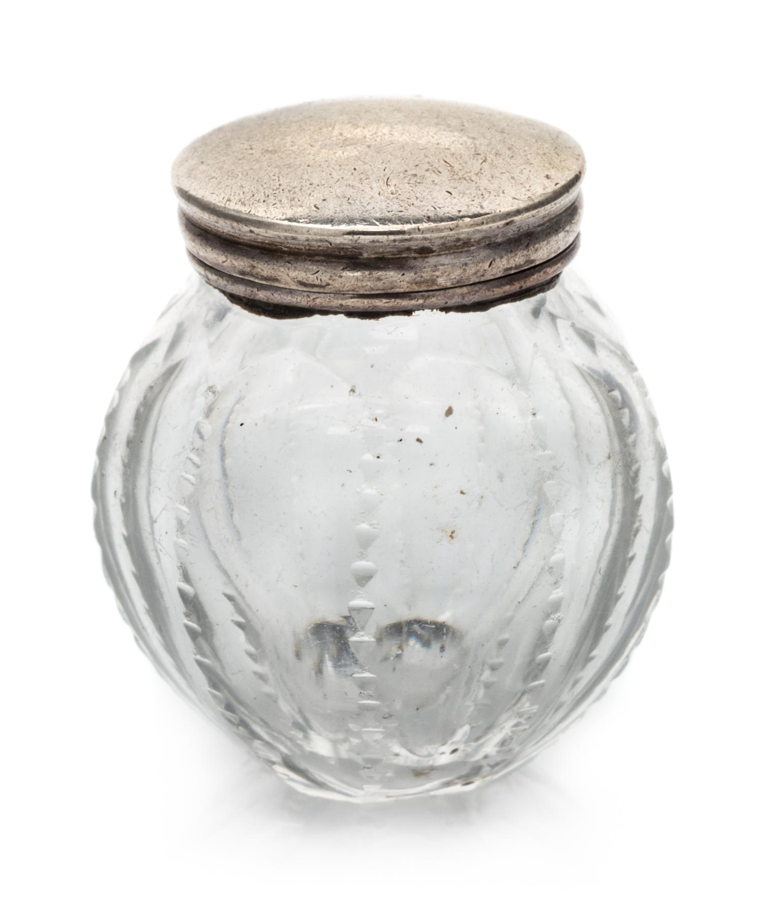 An English Silver Mounted Cut Glass Scent Bottle, Maker's Mark Likely IT, of ribbed, spherical form.