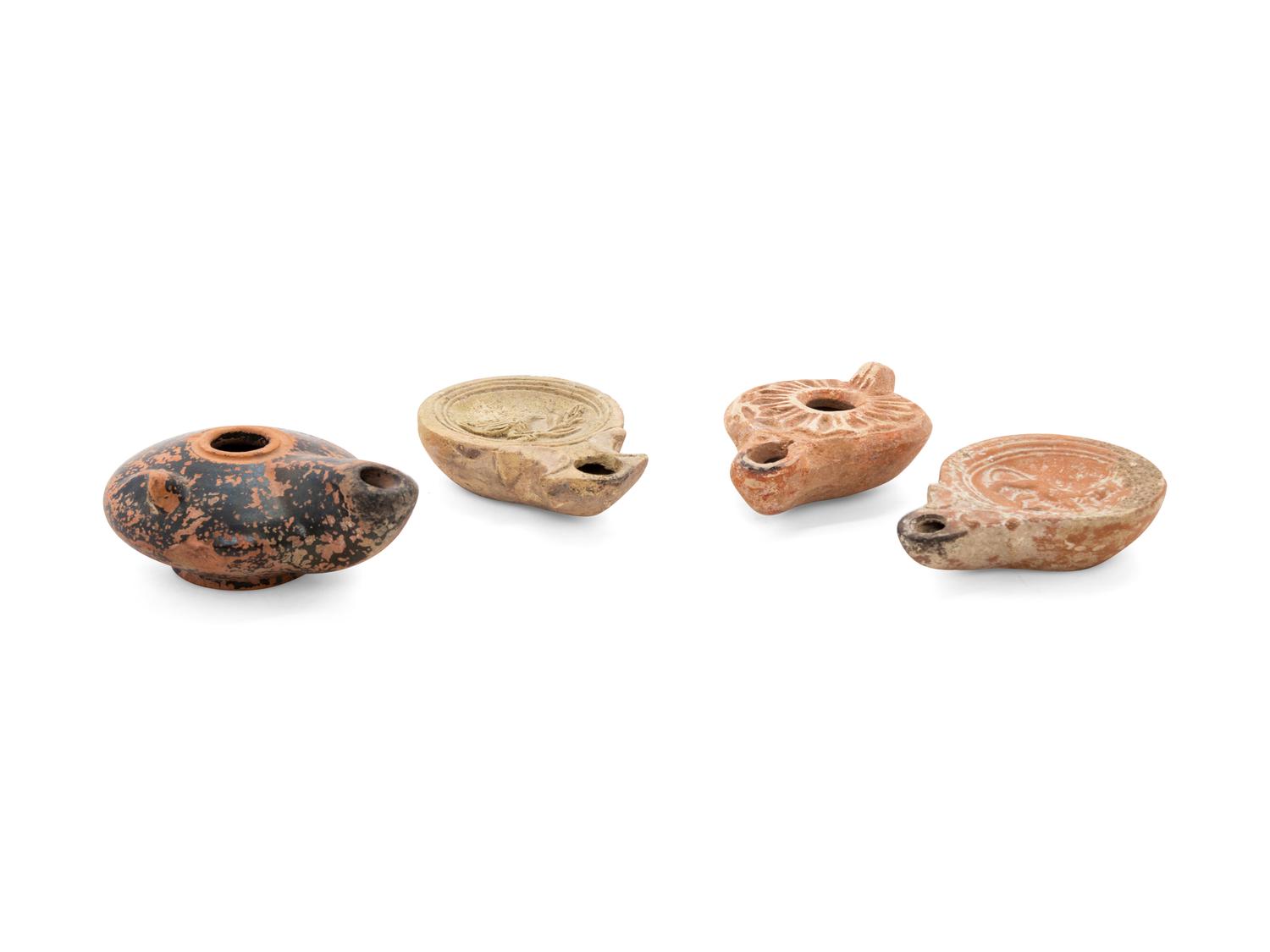 Four Ancient Terra Cotta Oil Lamps