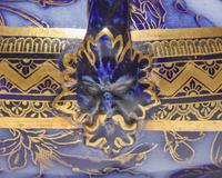 A Wedgwood Three-Piece Parcel-Gilt Garniture