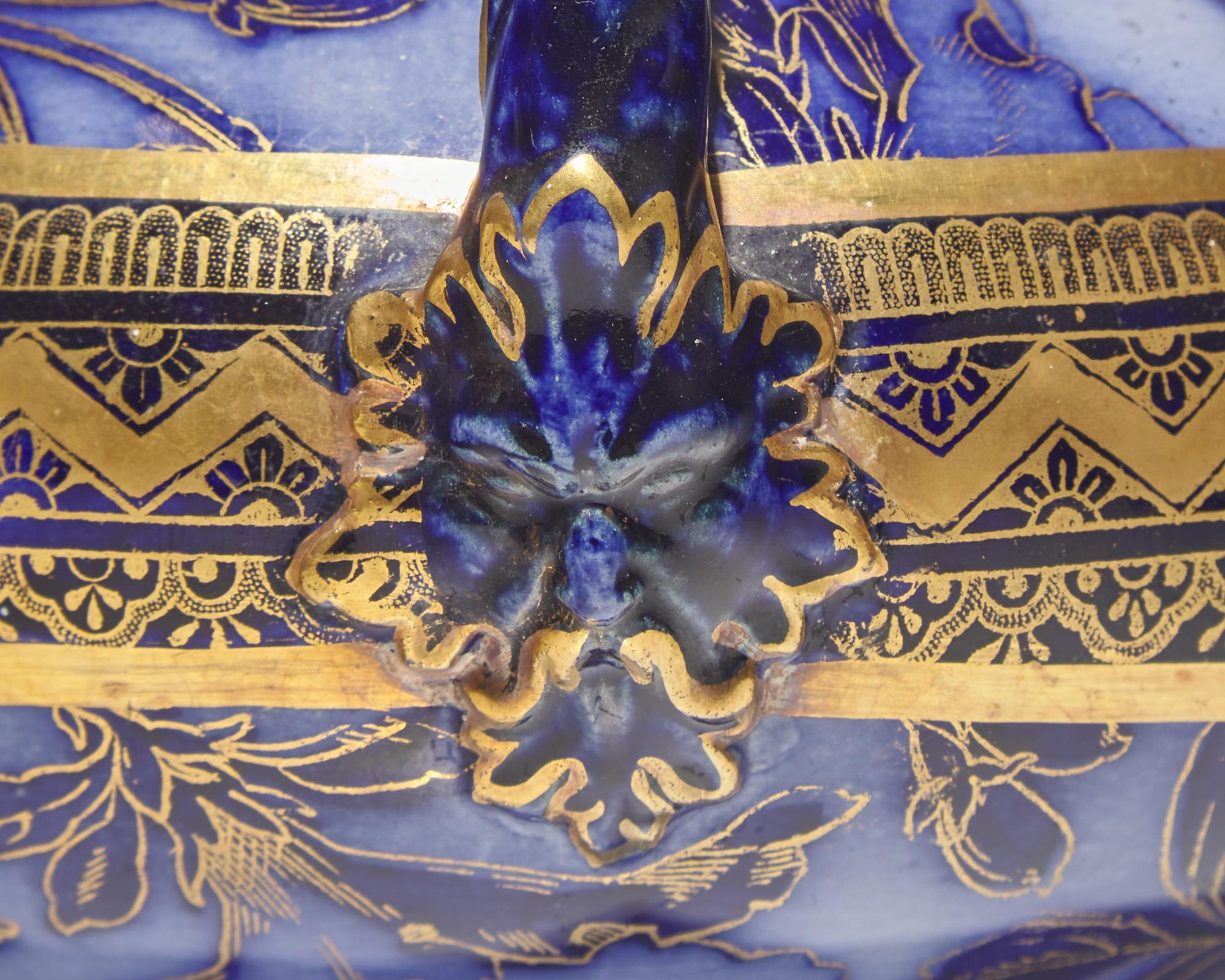 A Wedgwood Three-Piece Parcel-Gilt Garniture