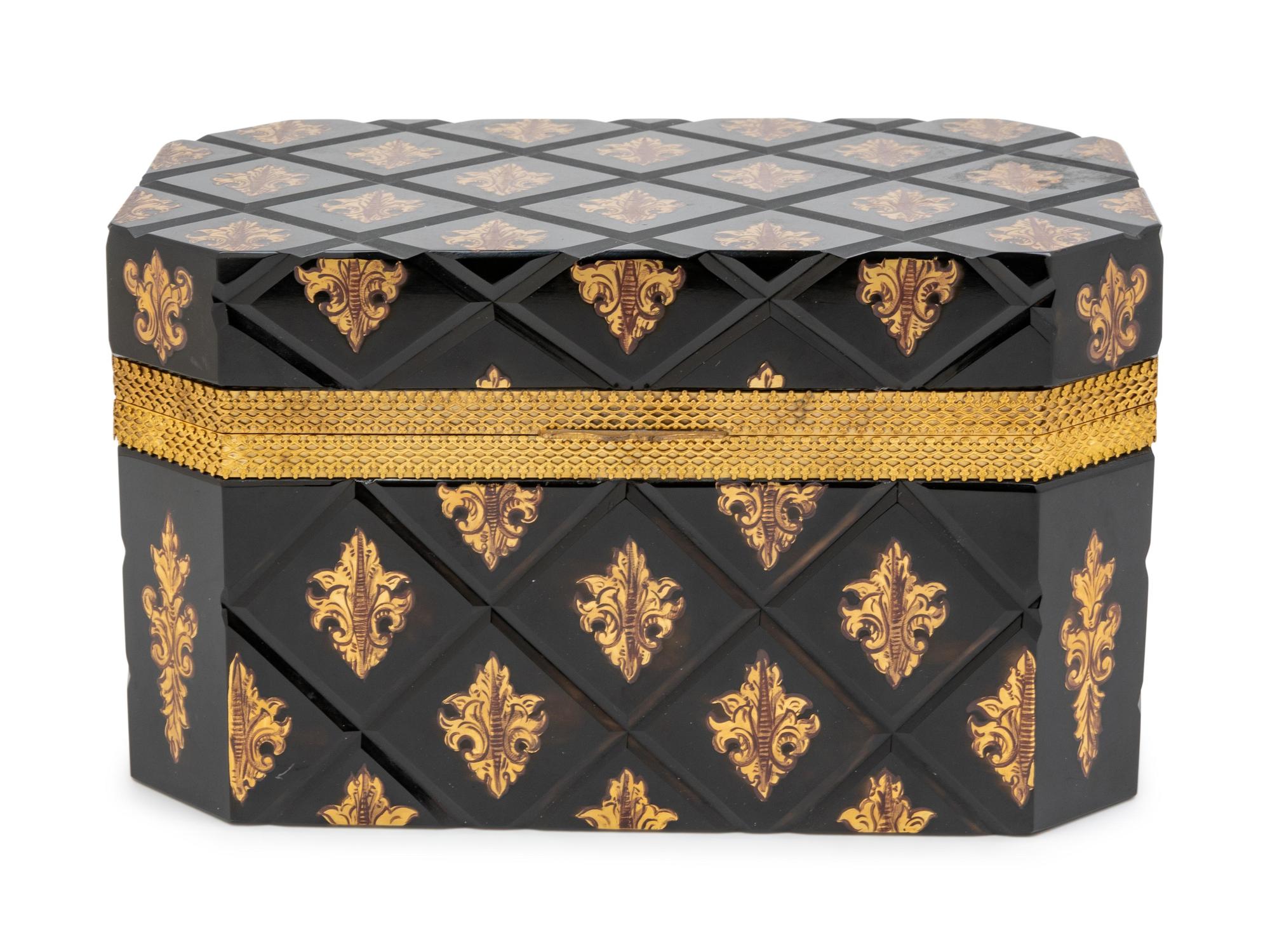 A Continental Gilt Metal Mounted Black Glass Table Casket