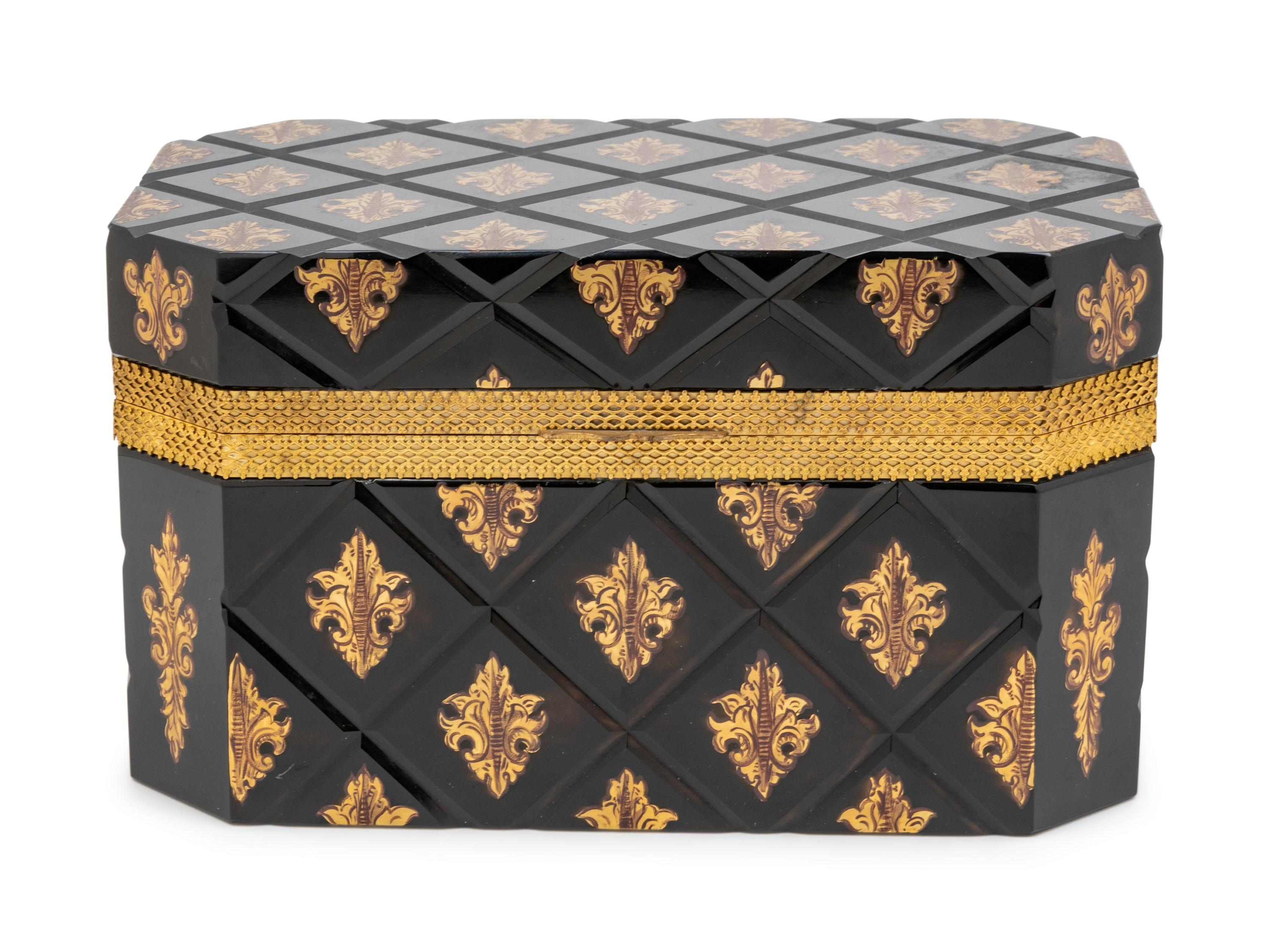 A Continental Gilt Metal Mounted Black Glass Table Casket