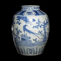 A Chinese Blue and White 'Birds and Trees' Porcelain Jar, 16th/17th Century 明末清初 青花花鳥圖大罐