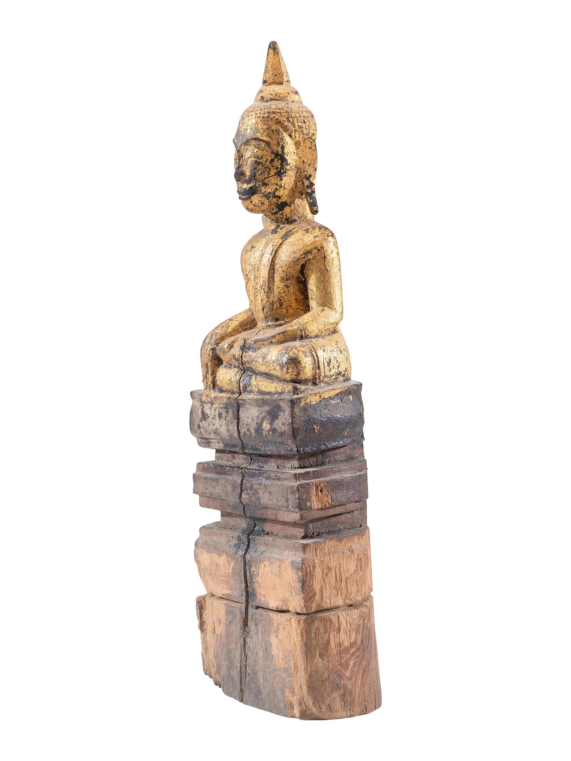 A Carved Giltwood Seated Buddha Figure
