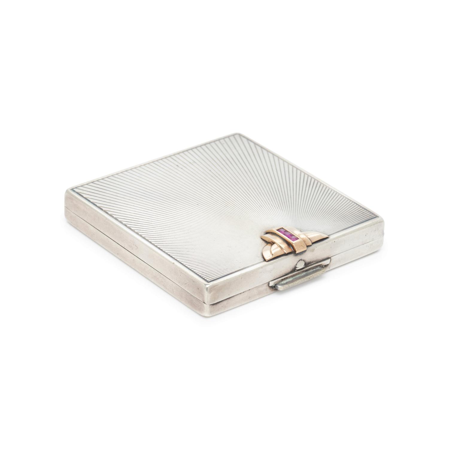 TIFFANY & CO., STERLING SILVER, YELLOW GOLD AND RUBY COMPACT
