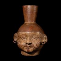 A Moche Portrait Head Vessel