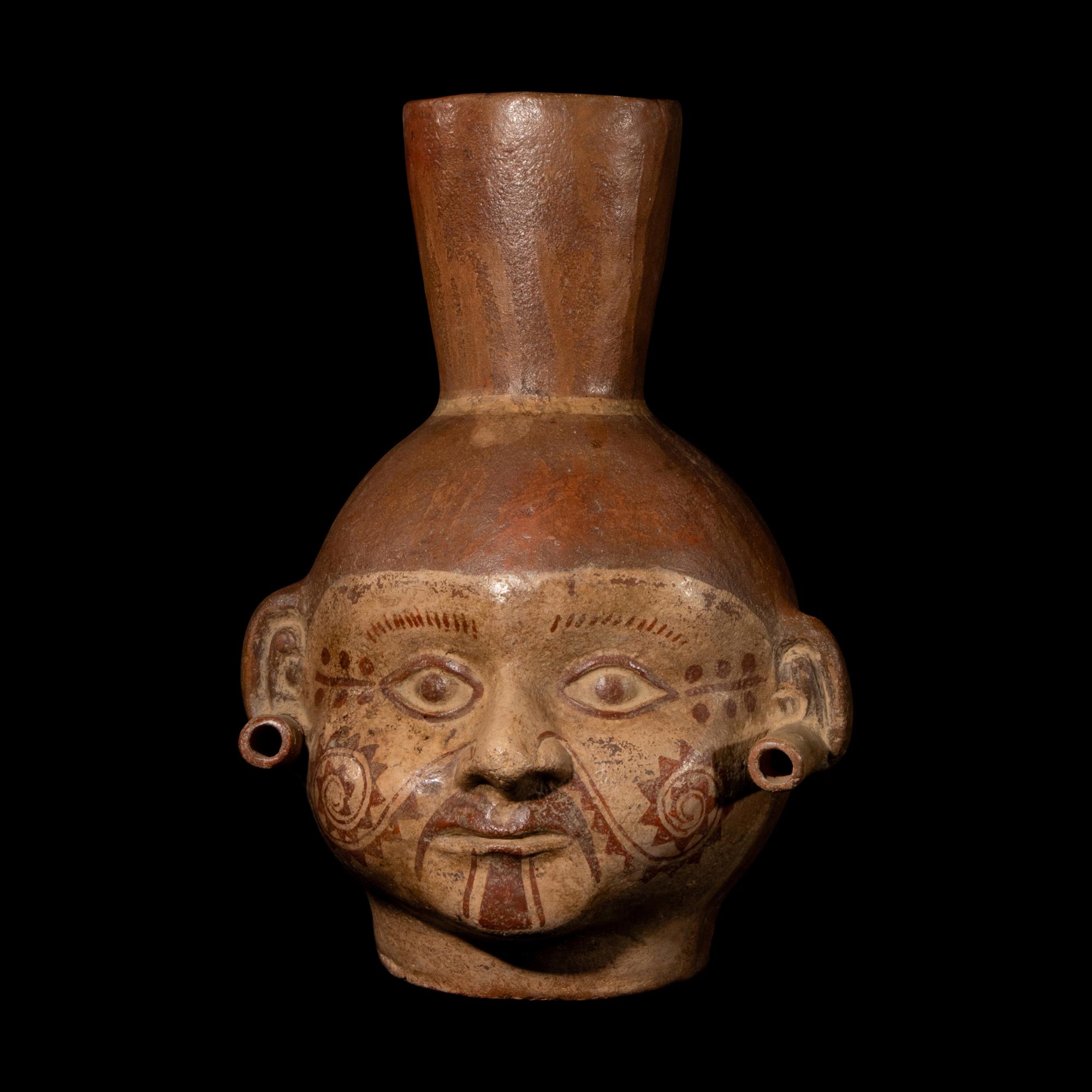 A Moche Portrait Head Vessel