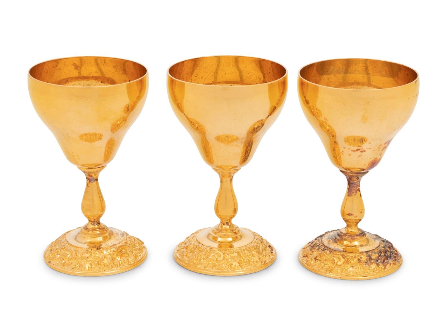 A Set of Twelve Gilt Metal Kiddush Cups