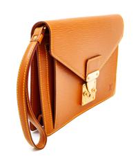 A Louis Vuitton Tan Epi Leather Sellier Dragonne Clutch, 6" H x 10.25" W x 1" D; Wristlet: 6" L.
