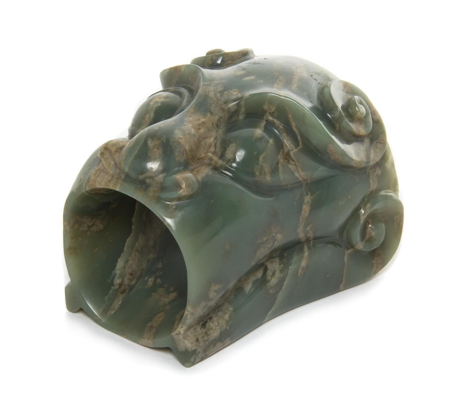 A Carved Jade Coupe Height 4 1/4 inches.