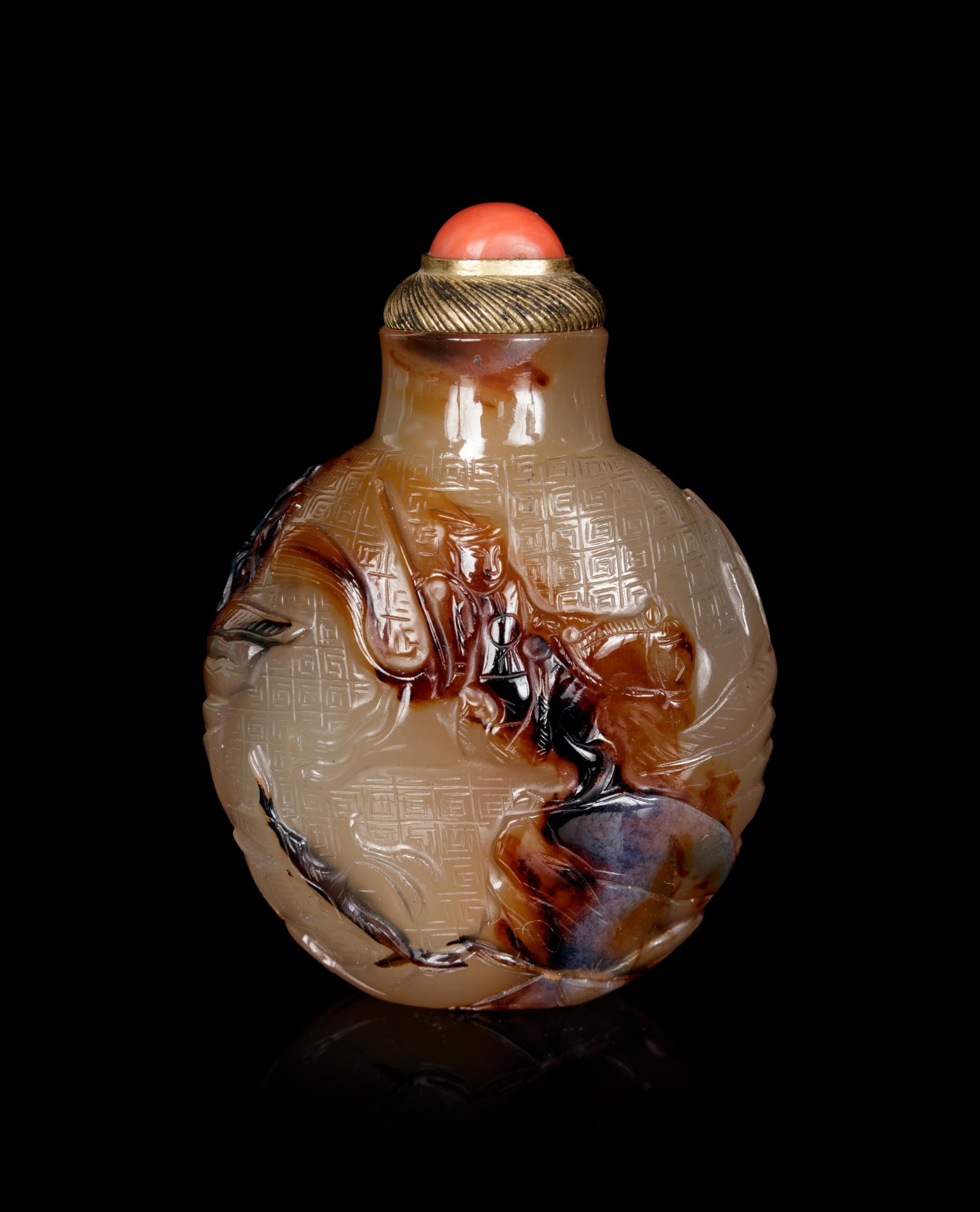 A Well Carved Shadow Agate Snuff Bottle