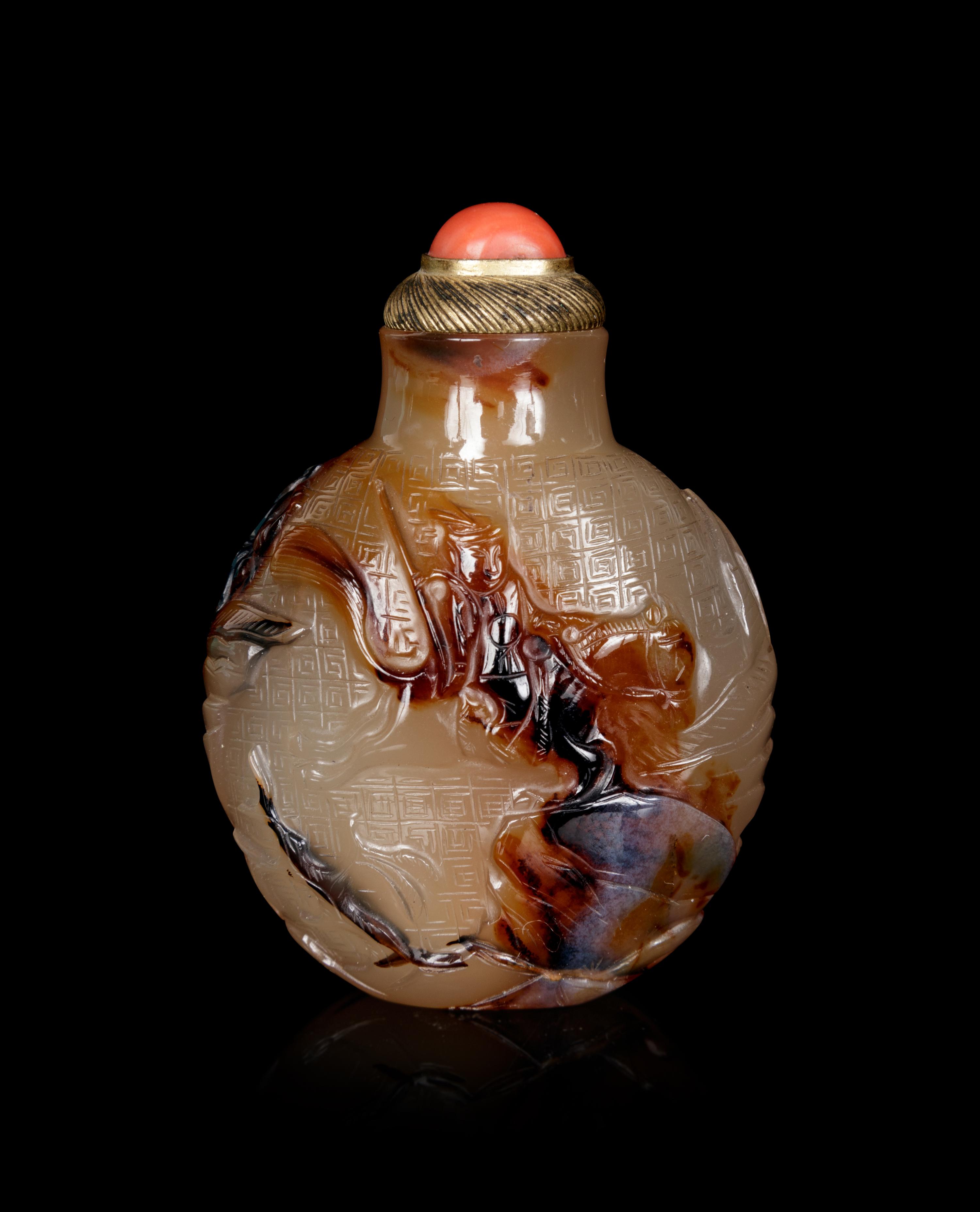 A Well Carved Shadow Agate Snuff Bottle