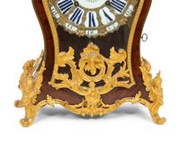 A Louis XV Gilt Bronze Mounted Kingwood Bracket Clock and Matching Wall Bracket