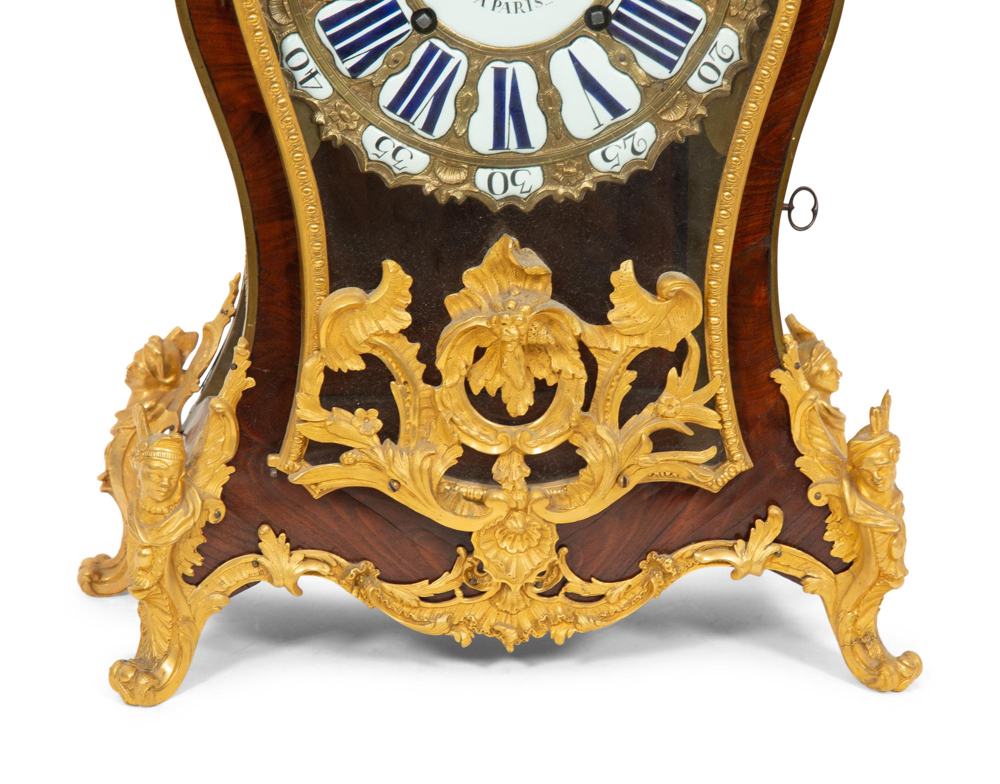 A Louis XV Gilt Bronze Mounted Kingwood Bracket Clock and Matching Wall Bracket