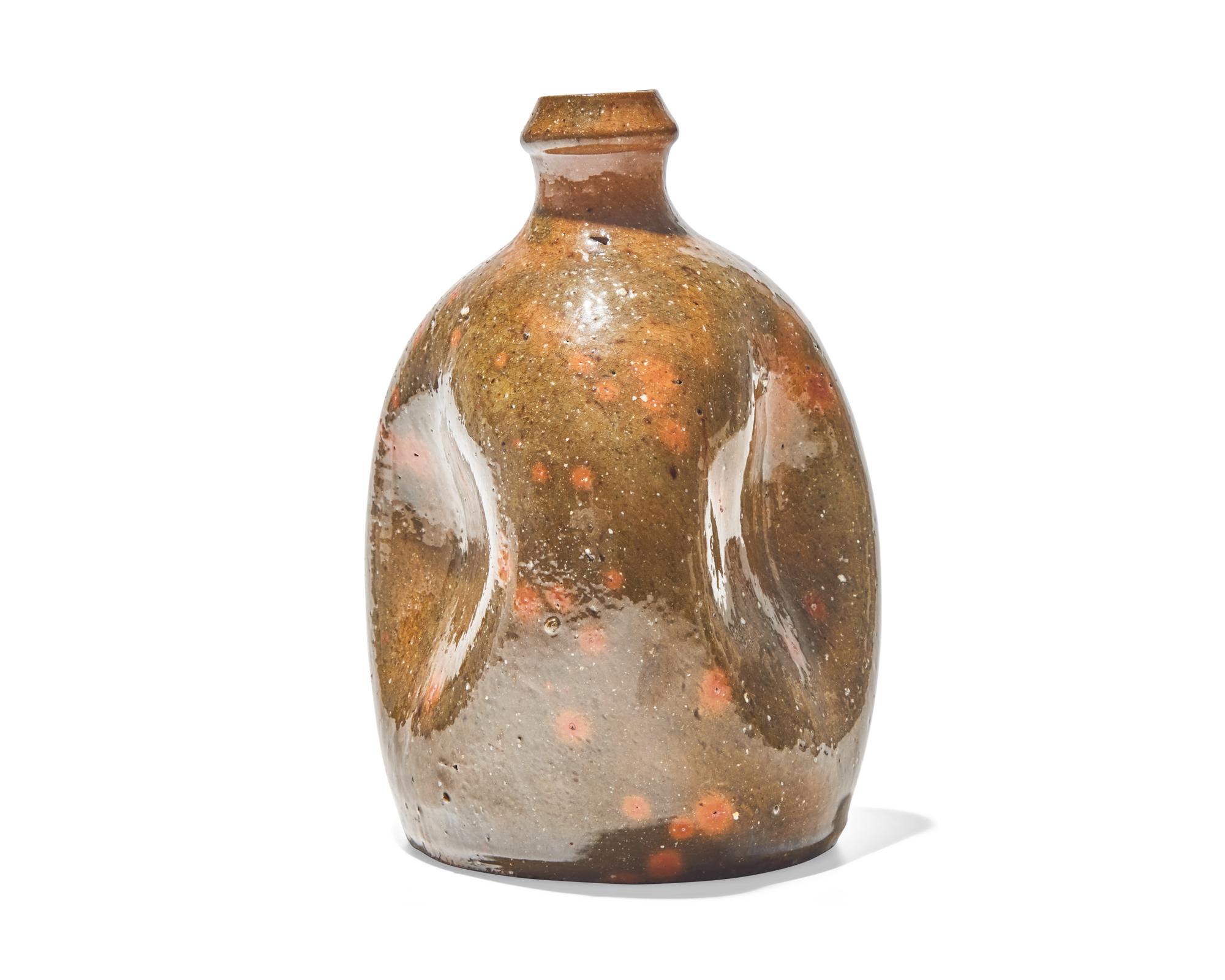 A Gonic-Glazed Pinch Form Redware Bottle, New England, 19th Century