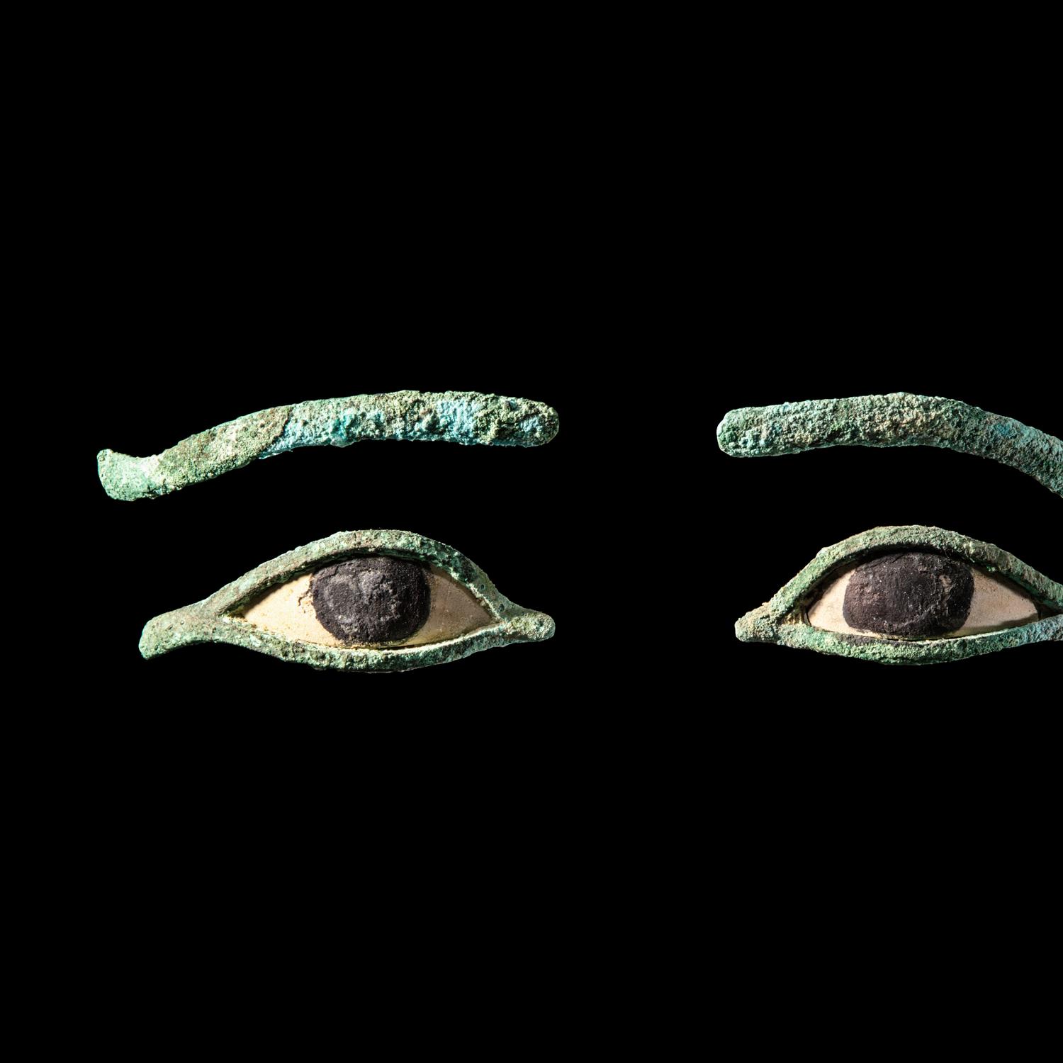A Pair of Egyptian Bronze Eye Inlays