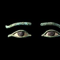 A Pair of Egyptian Bronze Eye Inlays