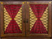 A Regency Style Parcel Ebonized Rosewood and Brass Inlaid Chiffonier