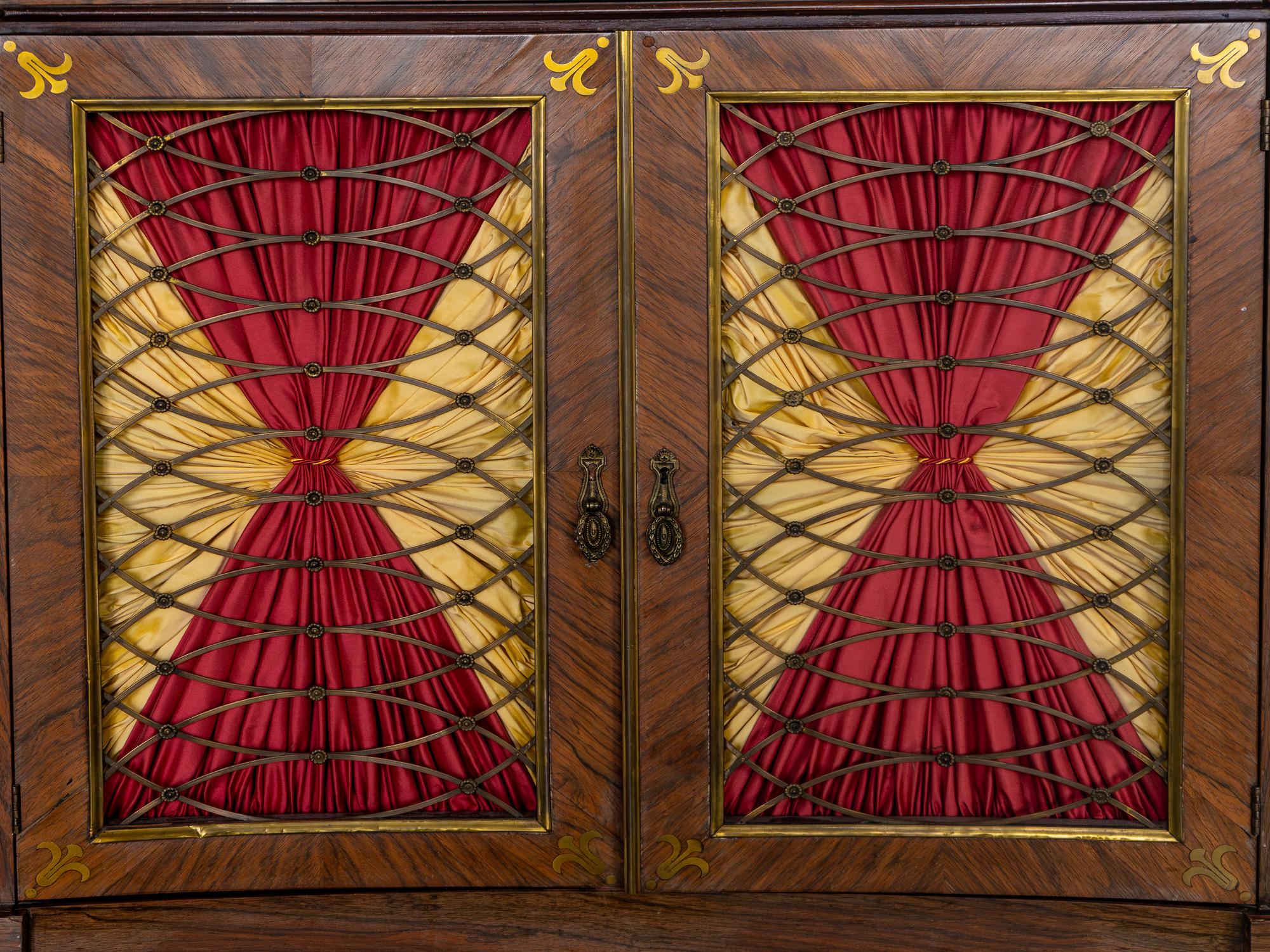 A Regency Style Parcel Ebonized Rosewood and Brass Inlaid Chiffonier