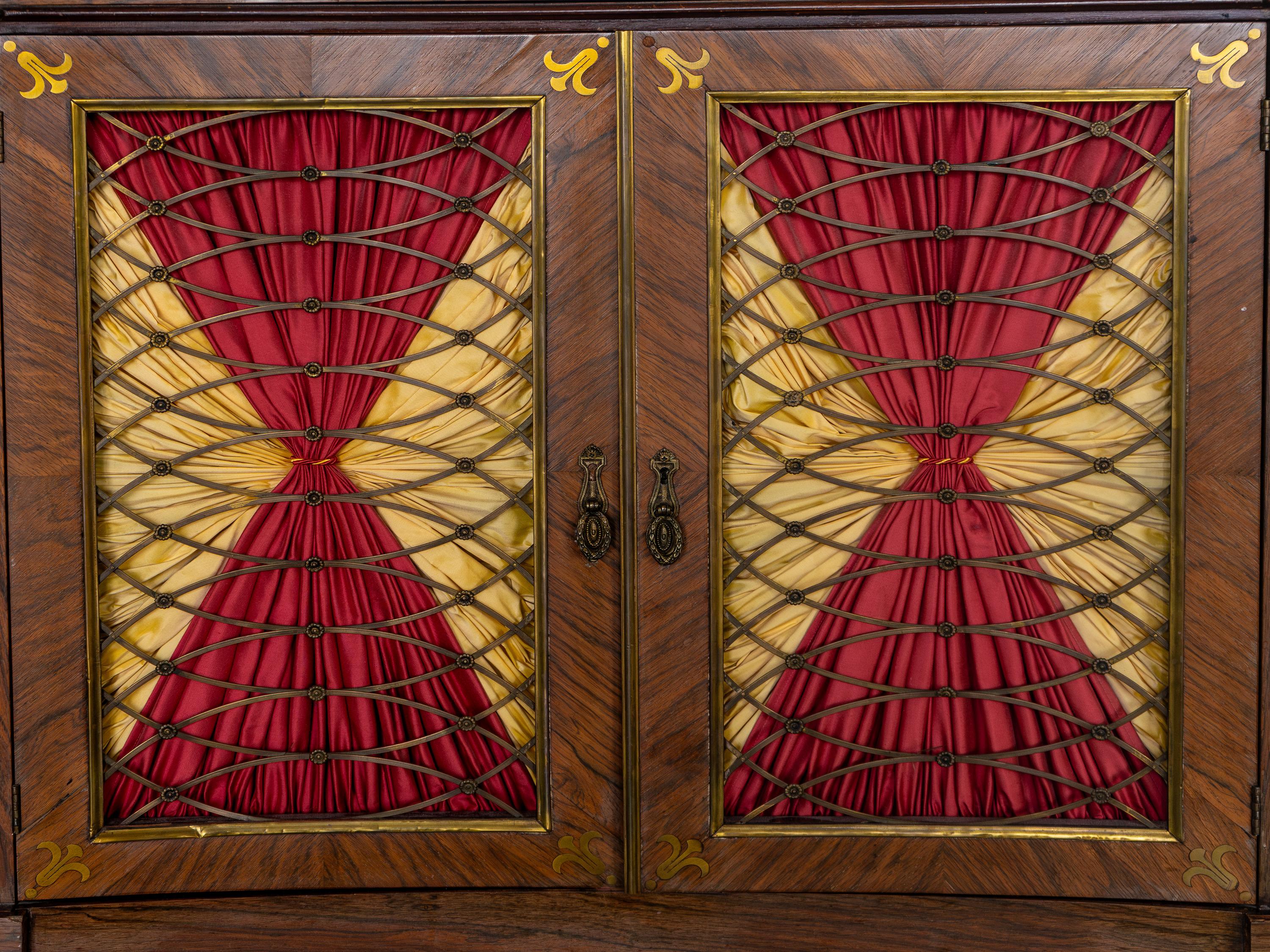 A Regency Style Parcel Ebonized Rosewood and Brass Inlaid Chiffonier