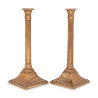 A Pair of George III Bronze Candlesticks