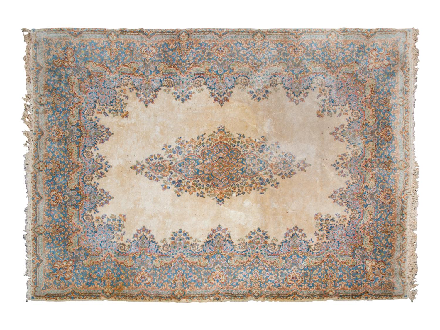 A Kirman Wool Rug
