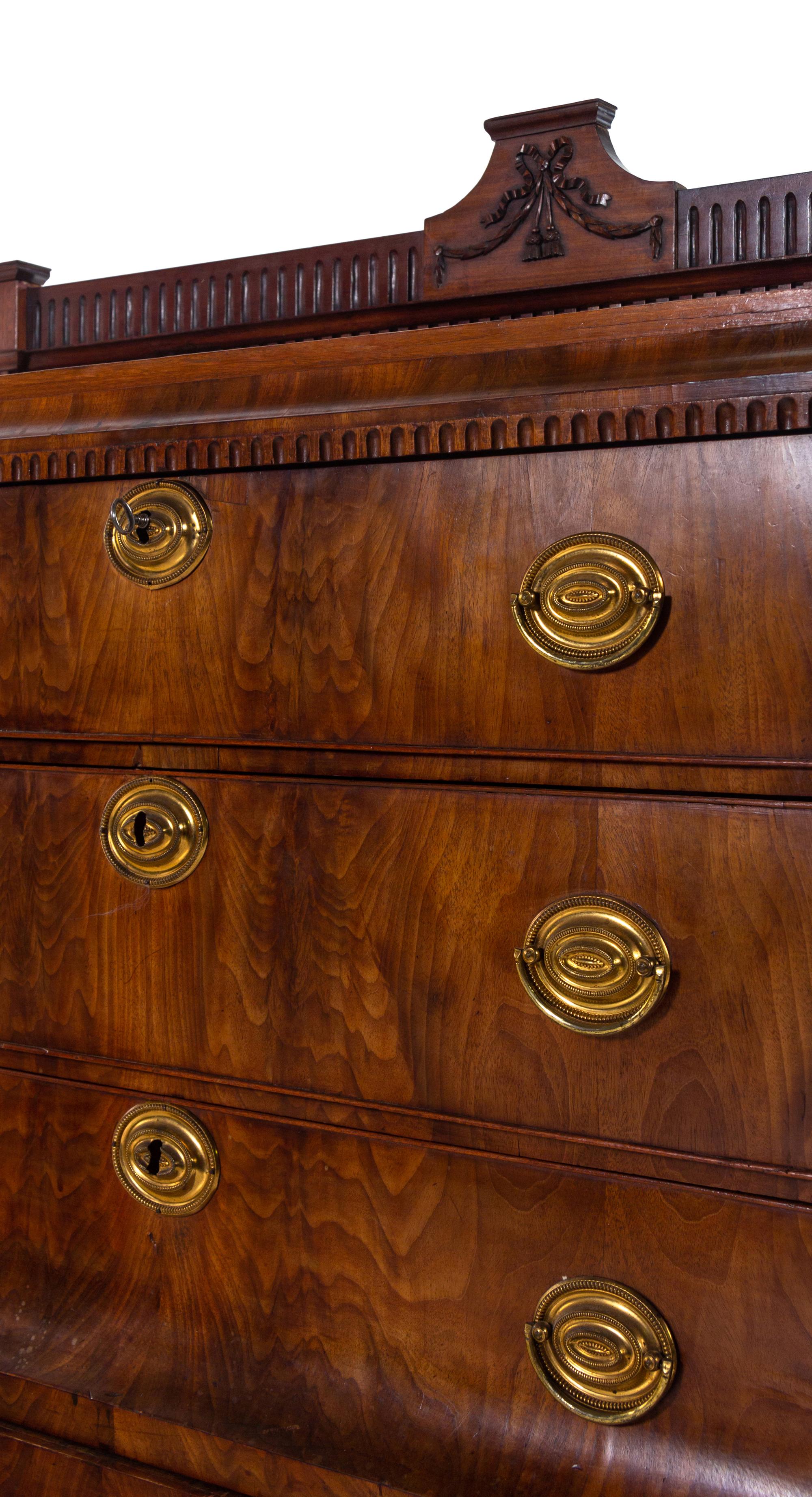 A Northern European Neoclassical Walnut Commode